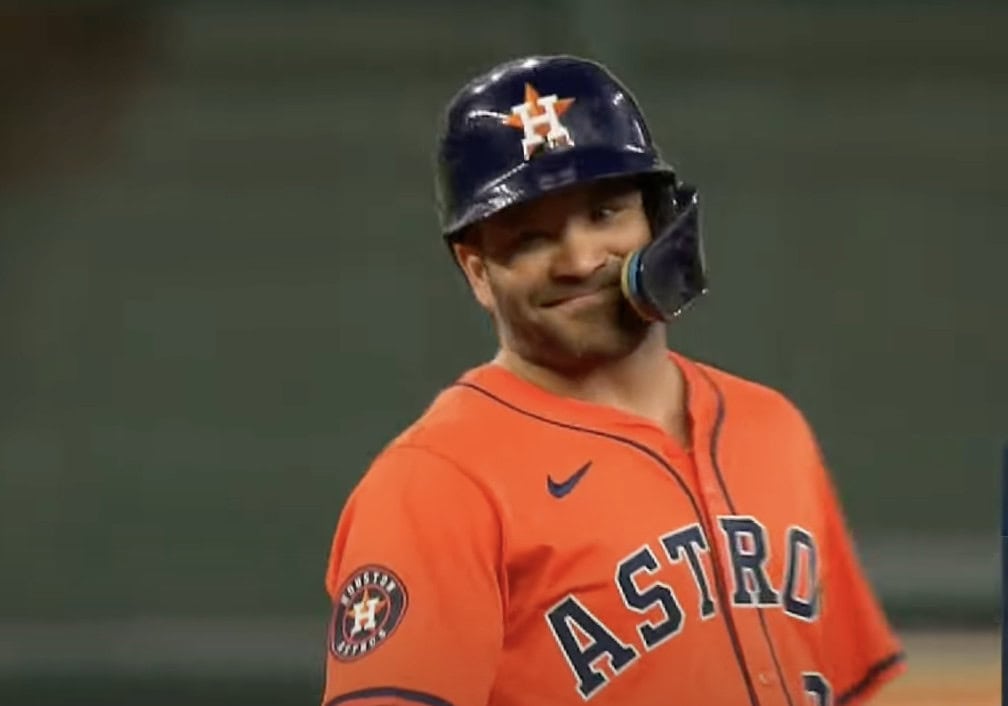 Jose Altuve showcasing his skills, featured in the ranking of top second basemen.